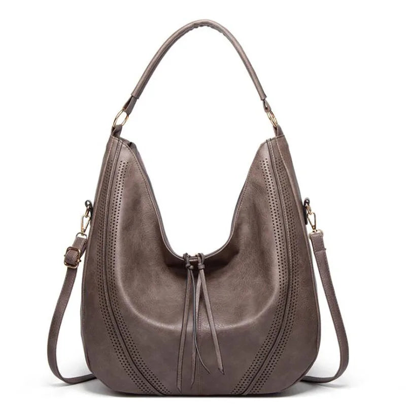 Minerva’s Classic Versatility  Vintage Leather Bag