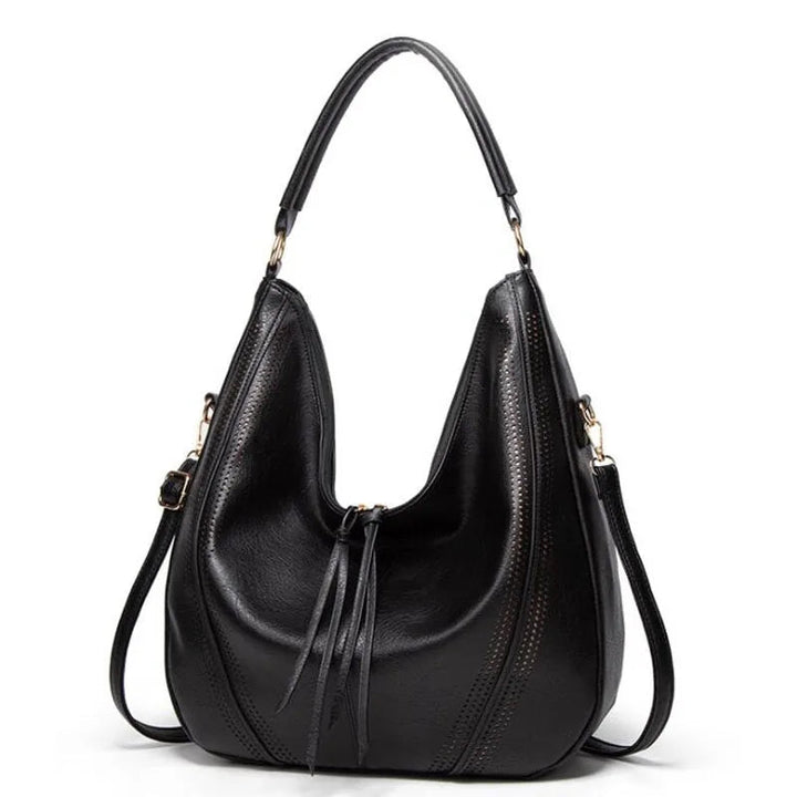 Minerva’s Classic Versatility  Vintage Leather Bag