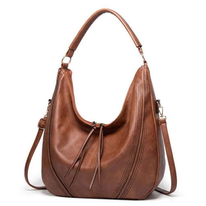 Minerva’s Classic Versatility  Vintage Leather Bag