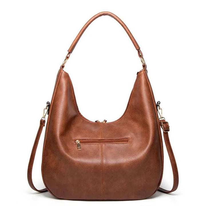 Minerva’s Classic Versatility  Vintage Leather Bag