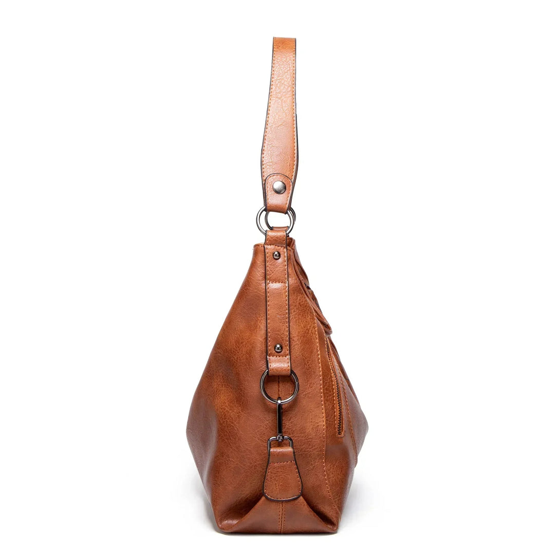 Priscilla’s Vintage Charm  Leather Bag